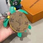 Louis Vuitton LV Women LV Turtle Pouch Bag Charm-Brown M01471