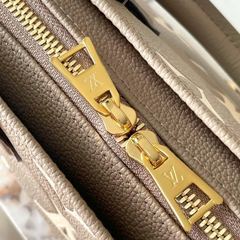 Louis Vuitton LV Women Onthego East West Bicolor Monogram Empreinte Leather M23641
