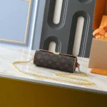 Louis Vuitton LV Women Pochette Camille Monogram M13566