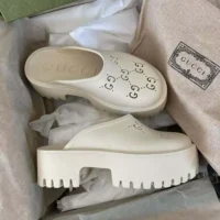 Gucci Women Rubber GG Monogram Perforated Elea Platform 55mm Lug Sole Sandals-White (1)