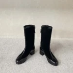 Botas altas Chanel para mujer de ante y piel de becerro, color negro