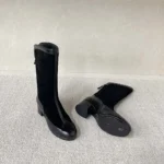 Botas altas Chanel para mujer de ante y piel de becerro, color negro