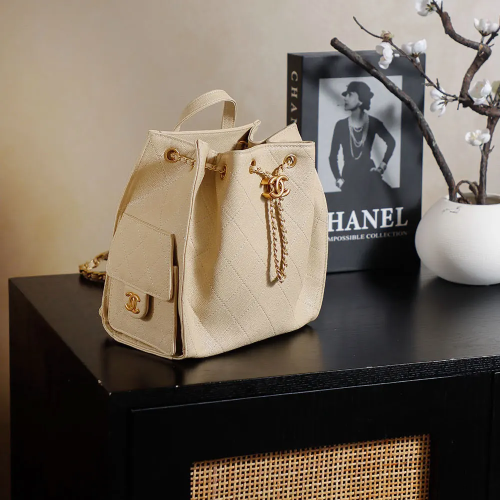 Chanel Women Chanel 25 Medium Backpack Grained Calfskin & Gold-Tone Metal-Beige (2) Chanel Women Chanel 25 Medium Backpack Grained Calfskin & Gold-Tone Metal-Beige