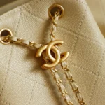 Chanel Women Chanel 25 Medium Backpack Grained Calfskin & Gold-Tone Metal-Beige