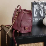 Chanel Women Chanel 25 Medium Backpack Grained Calfskin & Gold-Tone Metal-Maroon