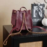 Chanel Women Chanel 25 Medium Backpack Grained Calfskin & Gold-Tone Metal-Maroon