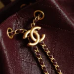 Chanel Women Chanel 25 Medium Backpack Grained Calfskin & Gold-Tone Metal-Maroon