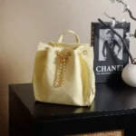 Chanel Women Chanel 25 Medium Backpack Grained Calfskin & Gold-Tone Metal-Yellow