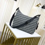 Dior Men Medium Rider Soft Hobo Bag Beige and Black Dior Oblique Jacquard with Black Grained Calfskin