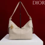 Dior Women Medium Dior Voyage Bag Powder Beige Flat Macrocannage Grained Calfskin