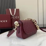 Gucci Women GG Emblem Small Shoulder Bag Rosso Ancora Red GG Leather