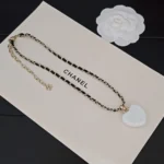 Chanel Women Necklace Metal Resin Calfskin & Strass Gold Pearly White Black & Crystal
