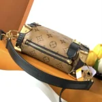 Louis Vuitton LV Women Side Trunk PM Monogram Coated Canvas Cowhide Leather