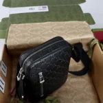 Gucci Men GG Emblem Small Crossbody Bag-Black 850238AAFOM - Image 10