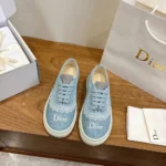 Dior Unisex Saltwind Sneaker Bleu Ciel Dior Oblique Embroidered Cotton and White Lace