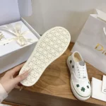 Dior Unisex Saltwind Sneaker White Cotton Embroidered with Bright Green Dior Clover Motif