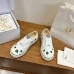 Dior Unisex Saltwind Sneaker White Cotton Embroidered with Bright Green Dior Clover Motif