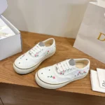 Dior Unisex Saltwind Sneaker White Cotton Embroidered with Multicolor Doves & Roses Motif