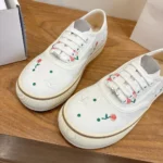 Dior Unisex Saltwind Sneaker White Cotton Embroidered with Multicolor Doves & Roses Motif