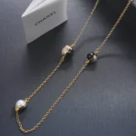 Chanel Women Long Necklace Metal & Resin Gold Black & Pearly White ABH162