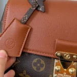Louis Vuitton Women Madeleine BB Monogram Cognac Brown Coated Canvas M28288