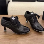 Chanel Women Quilted High-Top Sneakers in 70mm Heel Black