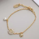 Dior Women CD Disco Bracelet Gold-Finish Metal White Resin Pearl and Crystals