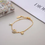 Dior Women CD Disco Bracelet Gold-Finish Metal White Resin Pearl and Crystals