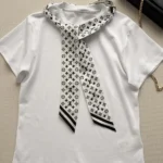 White 100% cotton interlock jersey 100% silk insert Signature print